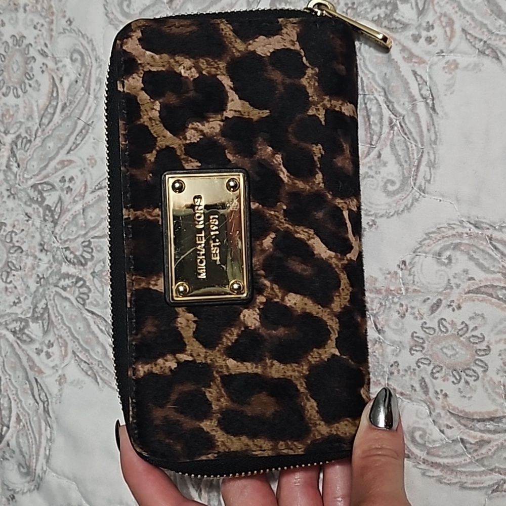 Gently used MICHAEL michael kors leopard wristlet